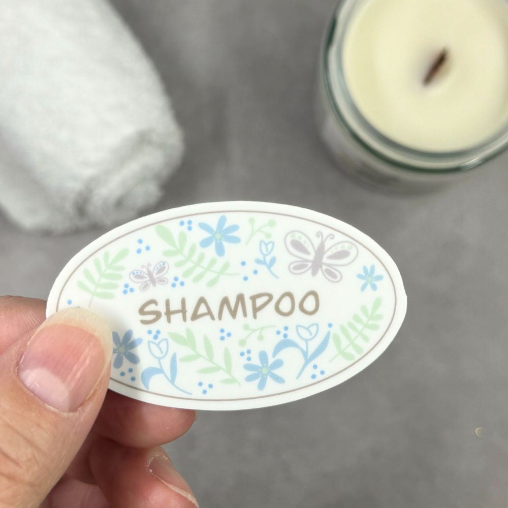 pastel garden doodle shampoo sticker held in hand